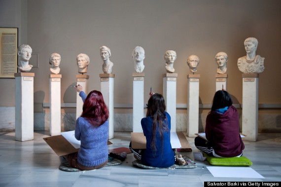 Students examining ancient sculptures, Museum Of Archeology, Istanbul, Turkey