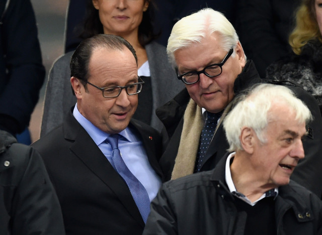 PARIS, FRANCE - NOVEMBER 13: Francois Hollande, President of France (L) and Frank-Walter Steinmeier, Foreign Minister of Germany attend the International Friendly match between France and Germany at the Stade de France on November 13, 2015 in Paris, France. (Photo by Matthias Hangst/Bongarts/Getty Images)